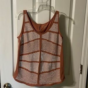 Loft tank with embellishment
